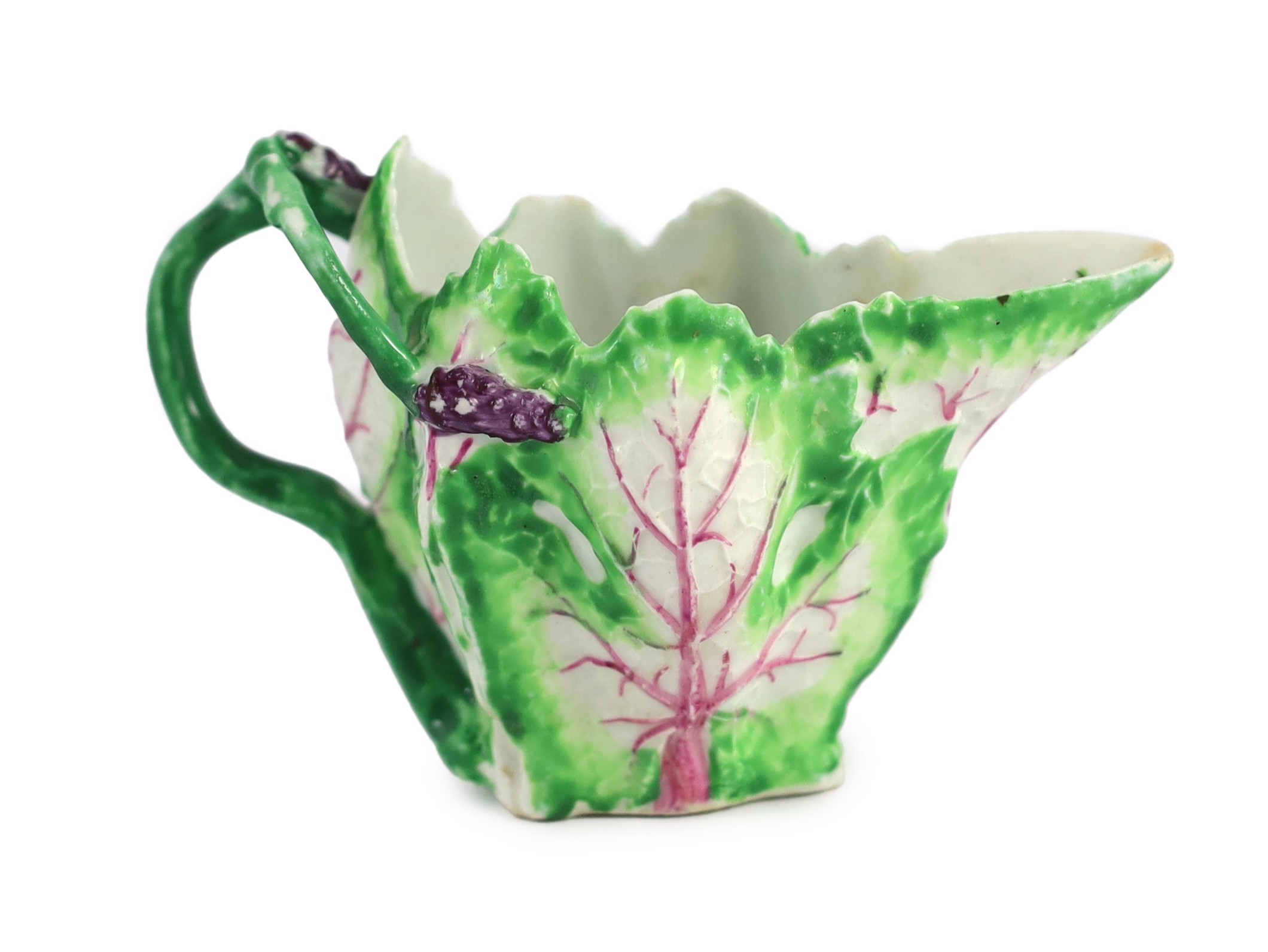A Longton Hall cream jug, c.1755, 12.5cm long 8.1 cm high, hairline cracks